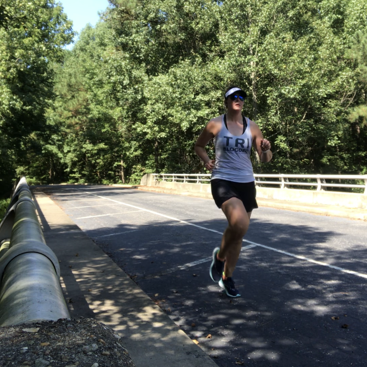 Chrissy running a race in a Bolder skirt