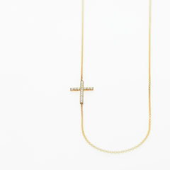 Gold and diamond horizontal cross necklace