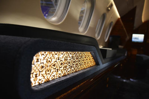 Brass incorporated into the interior design of Dassault Falcon Service private jets