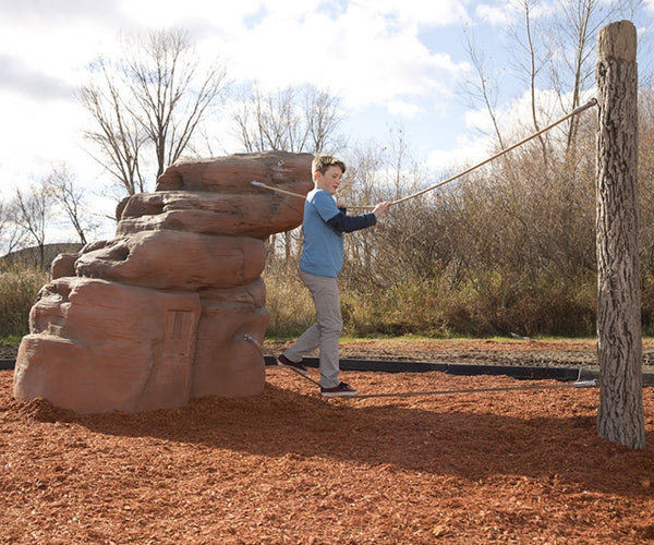 small playground climbing boulders in