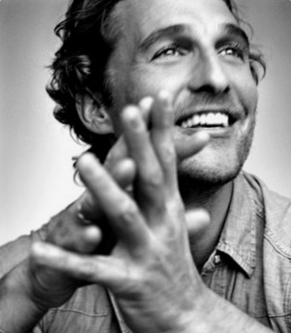 Matthew McConaughey smiling with teeth