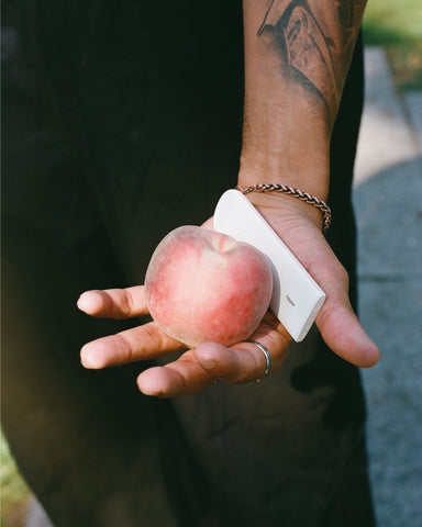 Peach ripple hand tattoo