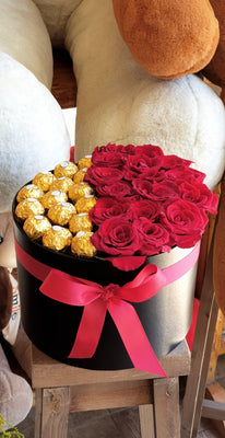 100 Red Roses Wpapped on Black Paper Bouquet