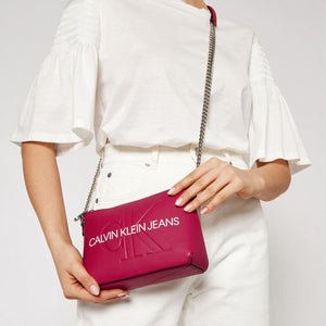 Calvin Klein cross body bag with chains in red