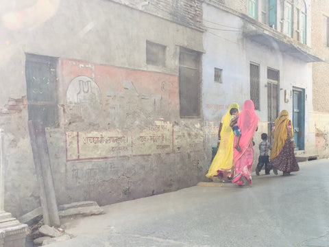 Indian women walking in village