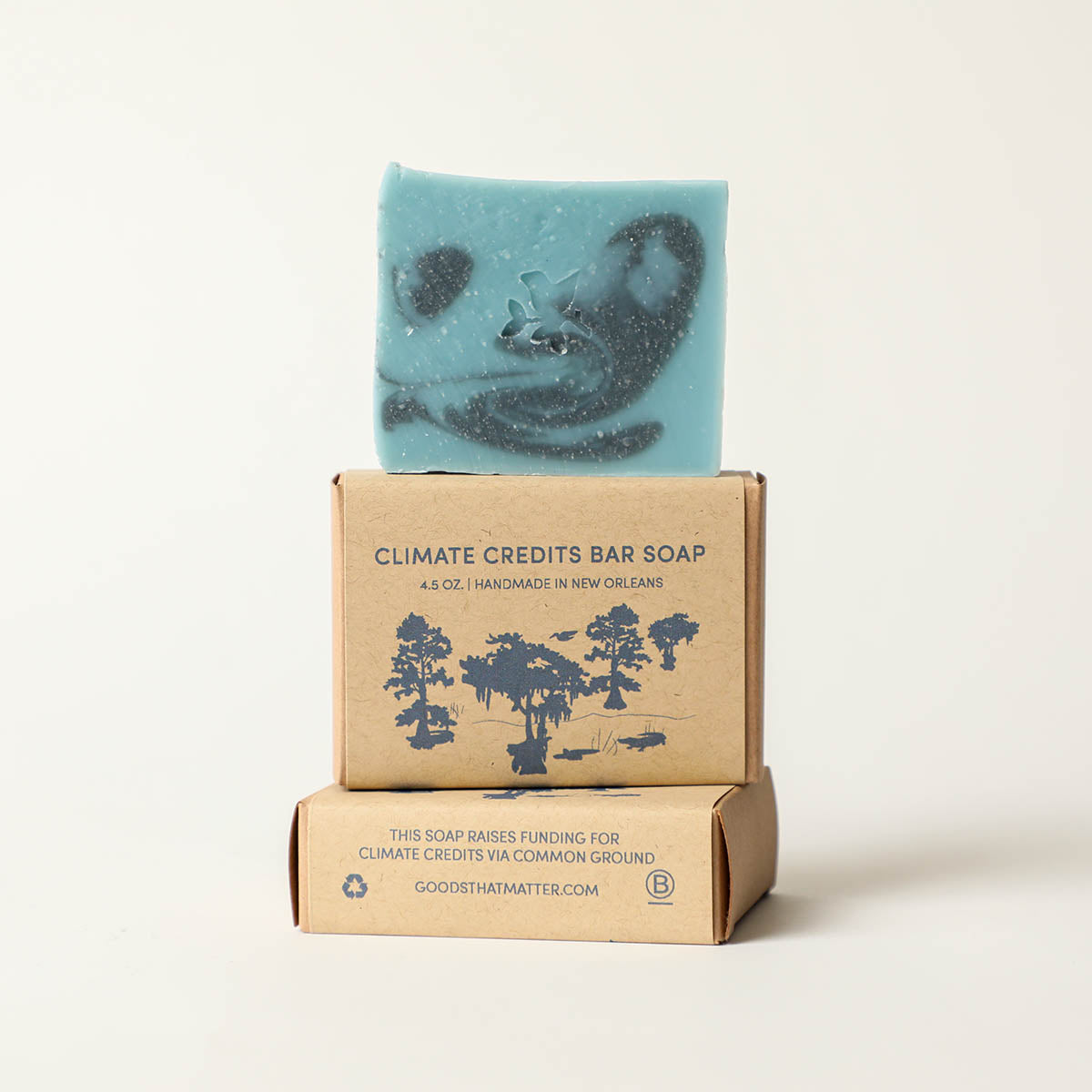 https://cdn.shopify.com/s/files/1/0101/0142/files/GoodsthatMatter-ClimateCreditsbarsoap-allnatural-essentialoils-givestoClimateCredits-carboncredits-commongroundrelief-cypresstrees-wetlandrestoration-climatechange-handmadeNewOrleans_a4620035-18a9-48f6-8ee3-816508d9779a.jpg?v=1688001155