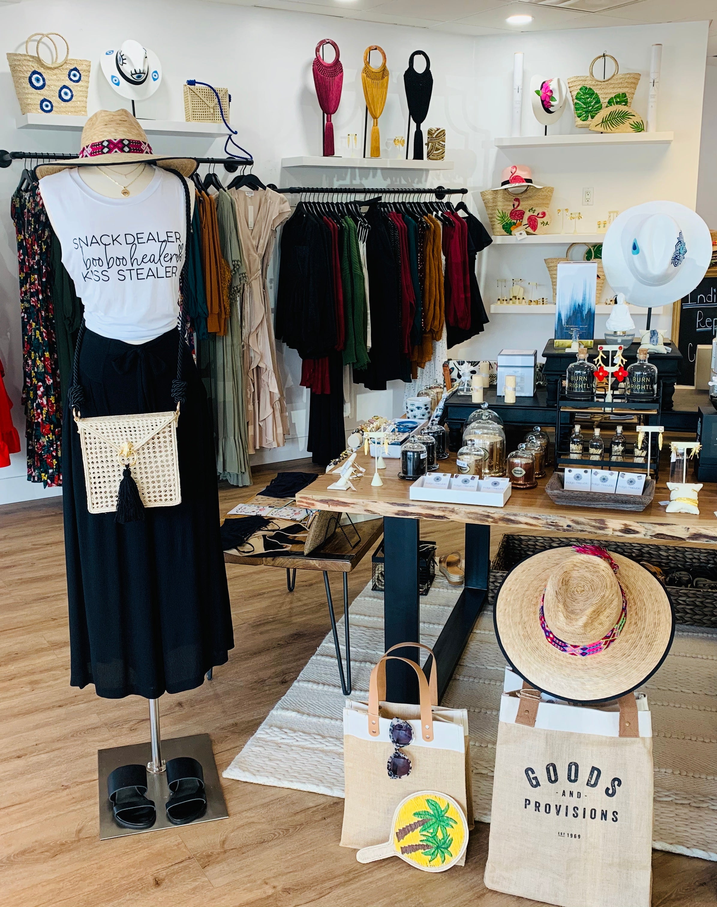 Straw hats, fans, apparel, sunglasses and candles at Indigo Republic Boutique