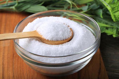 monk fruit extract with bamboo spoon in bowl