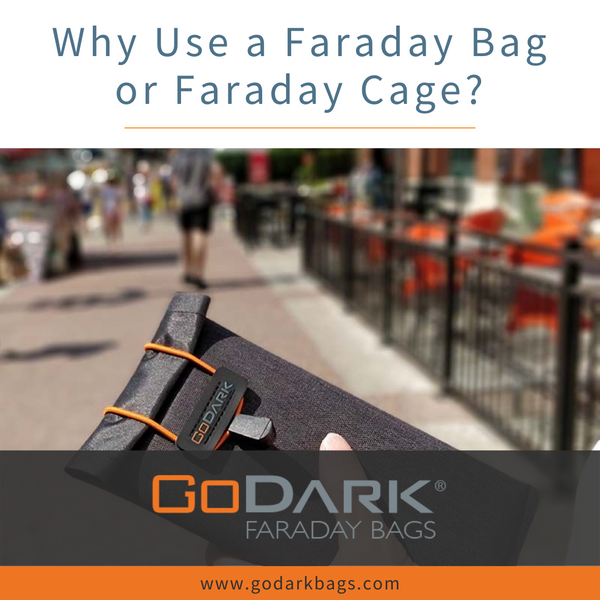 Person holding GoDark Faraday Bags