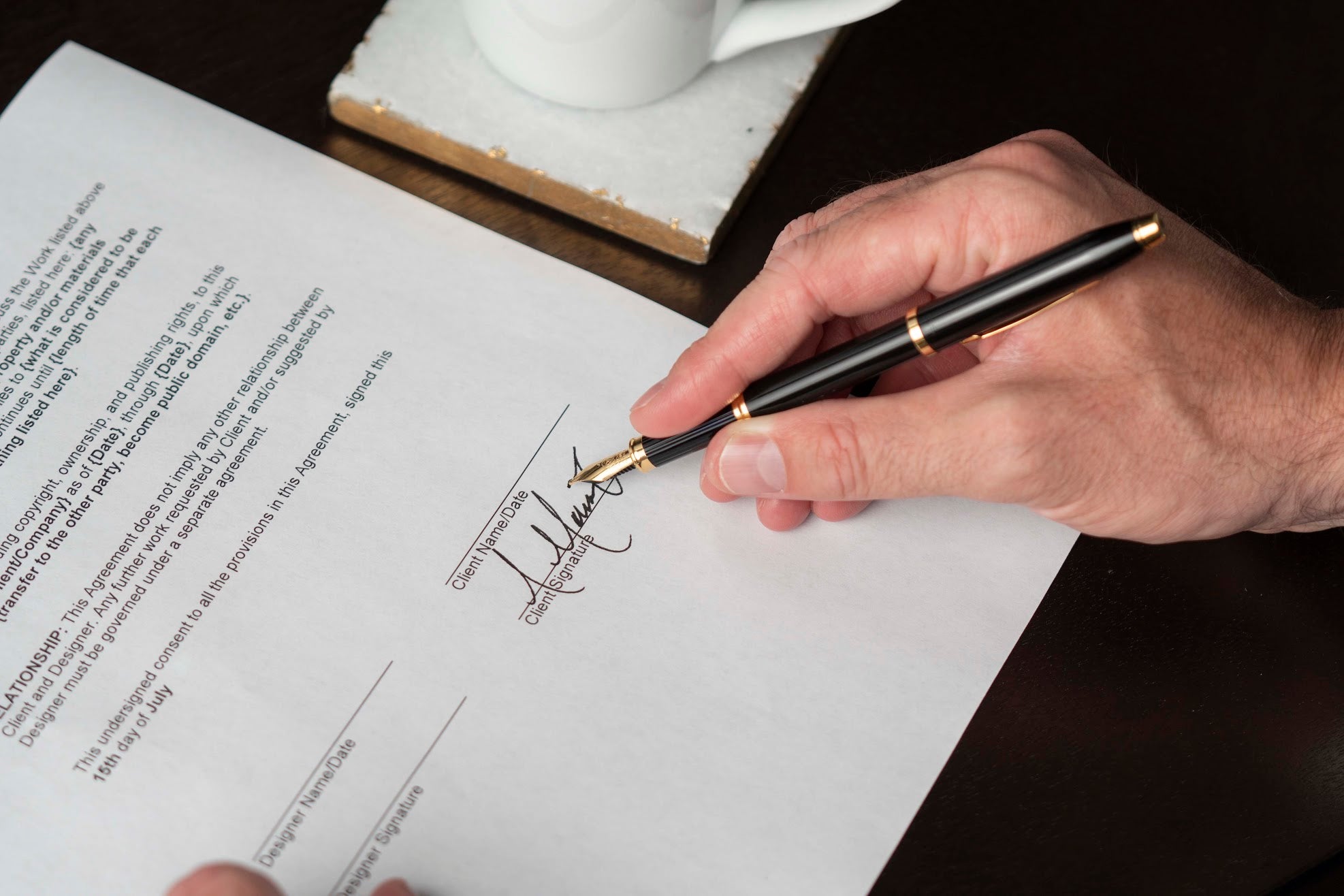 Man signing document with a Century II fountain pen