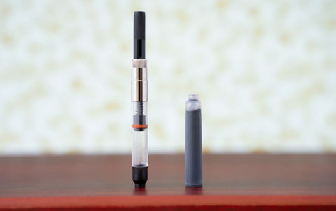 A Fountain Pen Converter and a Universal Ink Cartridge