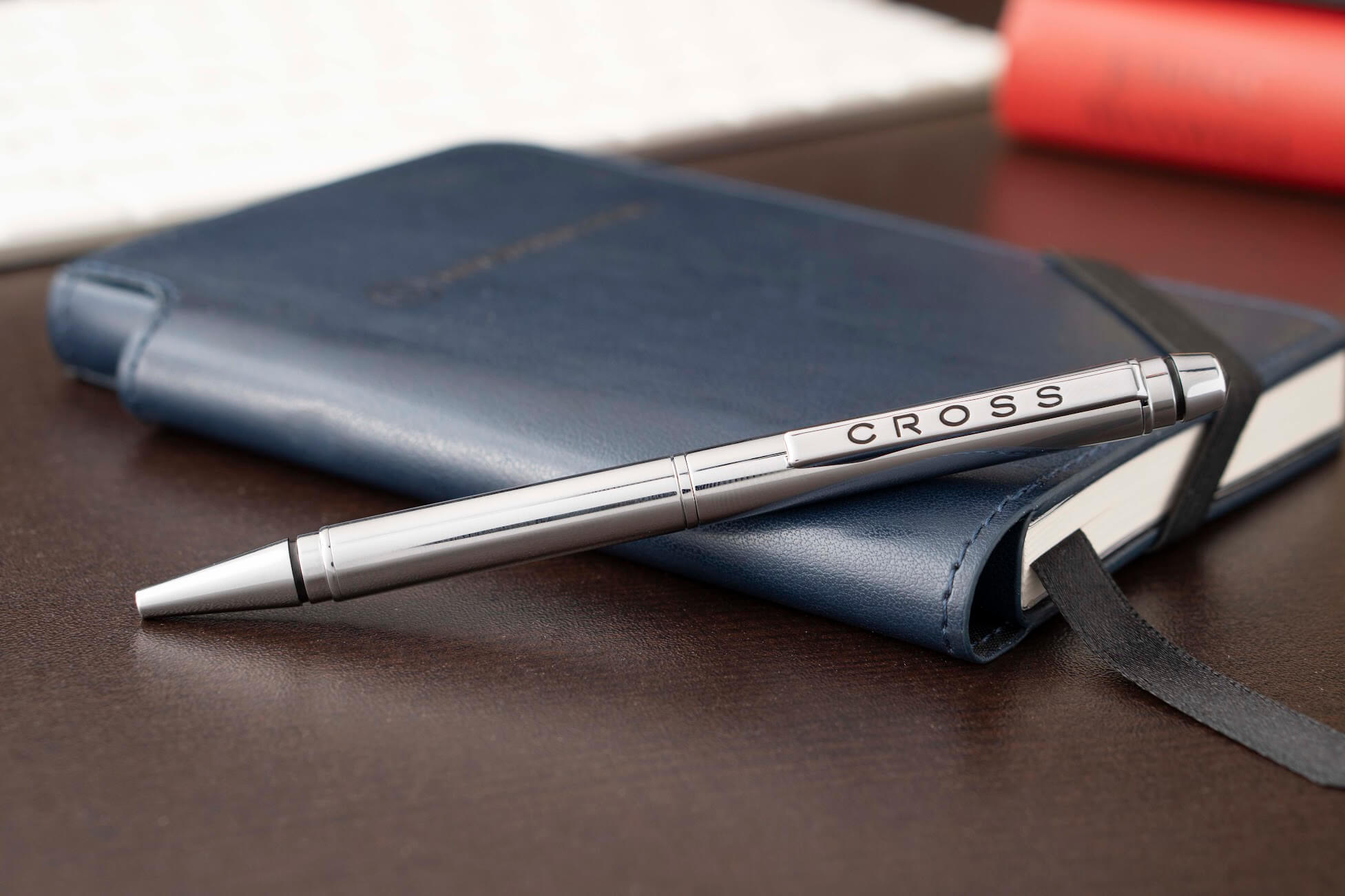 Cross Blue Journal and Pen gift set lying on a desk