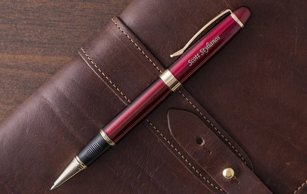 Dayspring Pens Alexandria Rollerball red pen on leather journal