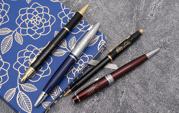 Different engraving styles on different pen styles