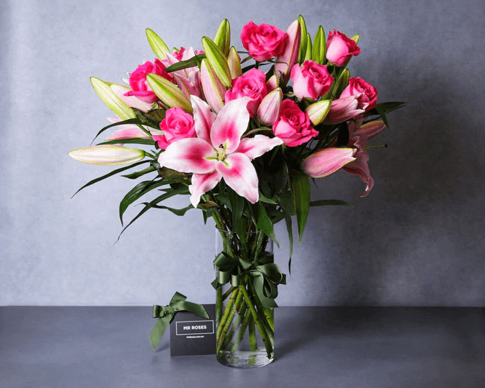 pink roses and pink lilies arrangement