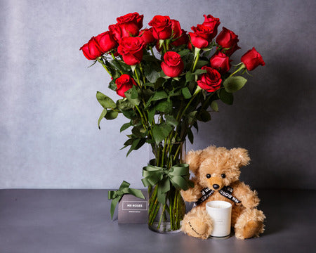red roses and teddy