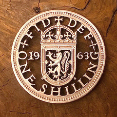 1961 One Shilling Cut Coin offered by Silver State Foundry