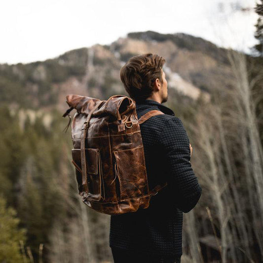 https://cdn.shopify.com/s/files/1/0101/4644/7423/products/the-kobuk-mens-leather-backpack-laptop-rucksack-antique-brown2.jpg?v=1588834322&width=533