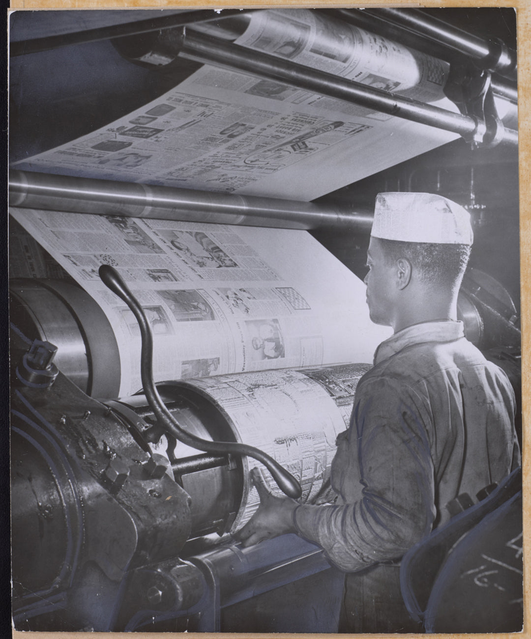 vintage photo of AFRO press operator