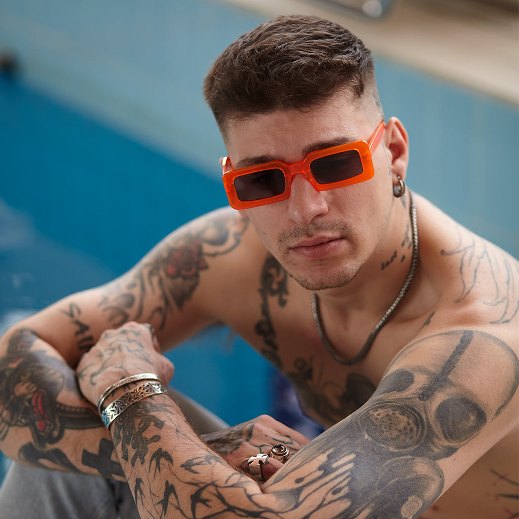 STEVE MILATOS WEARING NEON DE-SUNGLASSES