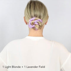 Back view of woman with blonde hair wearing lavender purple hair extensions in an updo with Easy Updo Extensions