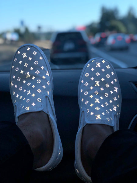 white reflective slip on vans