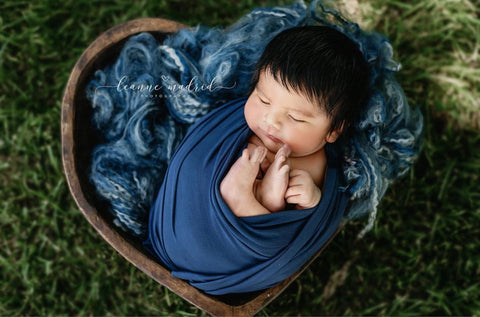 baby in basket photoshoot