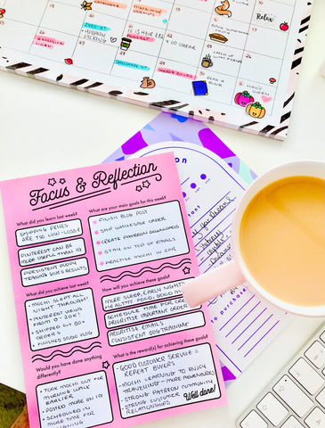 pink desk pad focus and reflection to set goals and plan your business by coconutacha