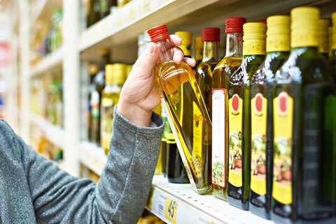 Olive oil in glass bottles