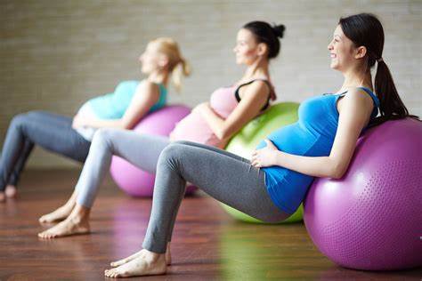 Pregnant Women Exercising on Exercise Balls