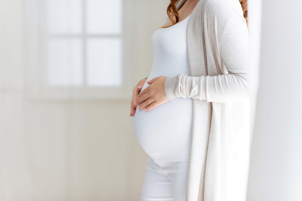 Photo De Femme Enceinte - Illustration Bénéfices Des Bas De Compression Pendant La Grossesse