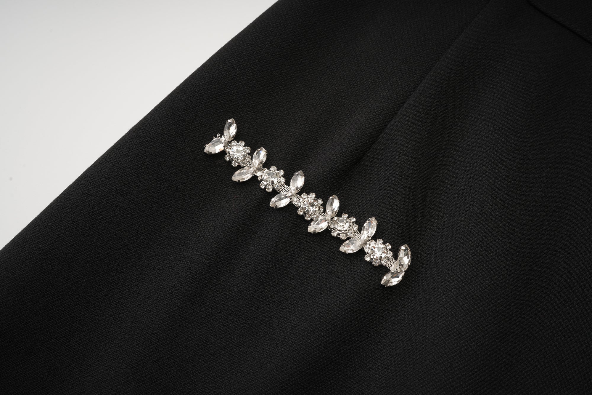 Black Curved Hem Skirt With Rhinestone Chain