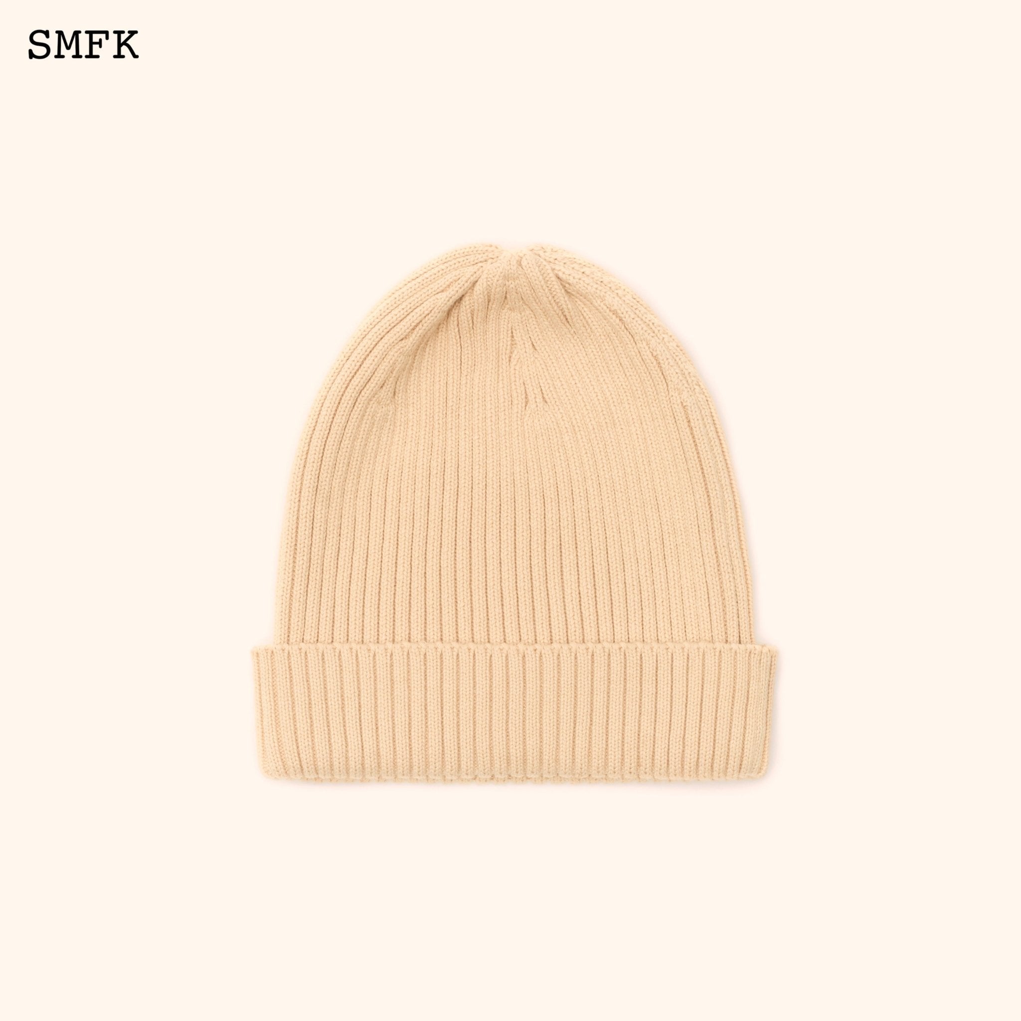 Compass Cross Cotton Beanie Hat In Wheat