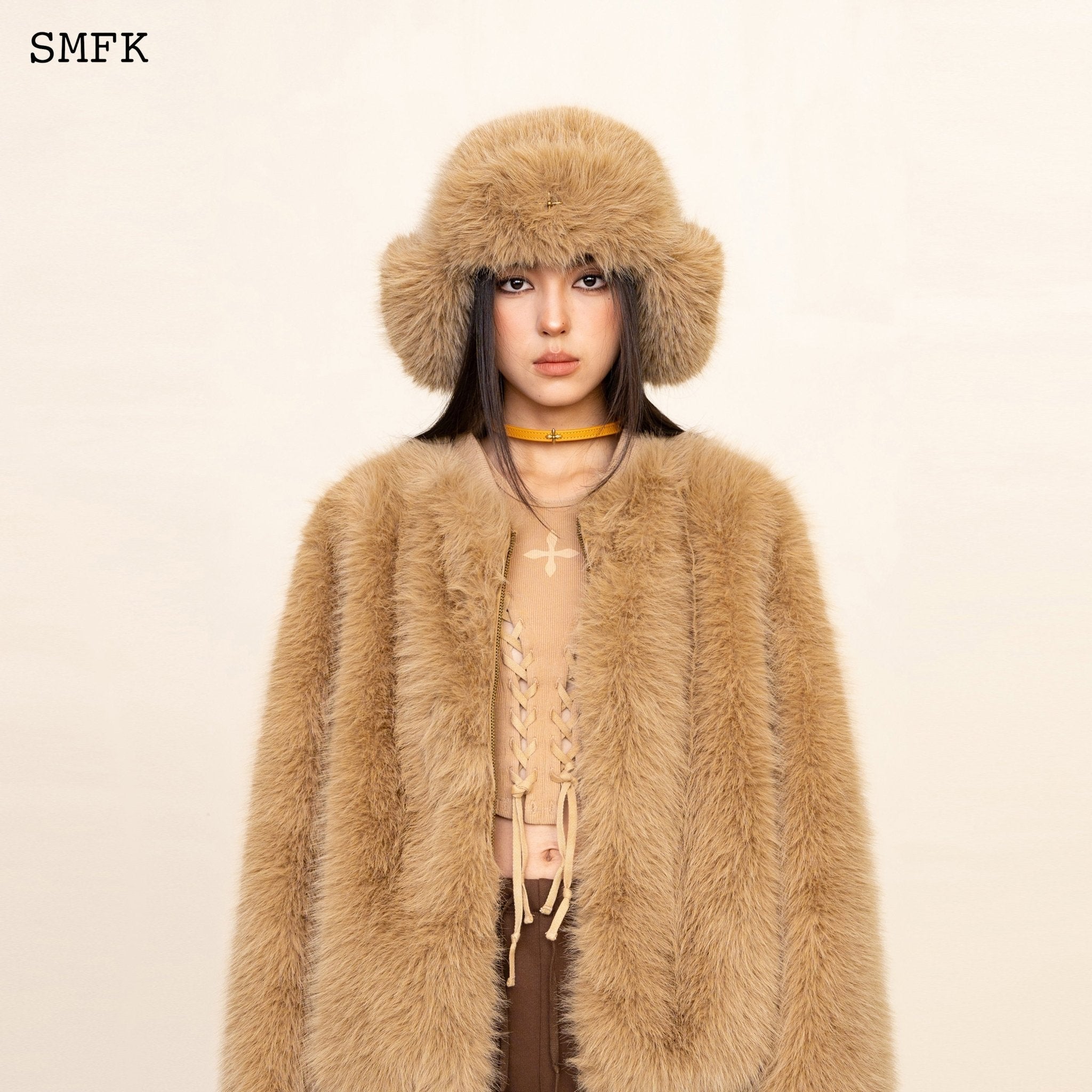 Compass Cross Winter Faux Fur Hat In Wheat