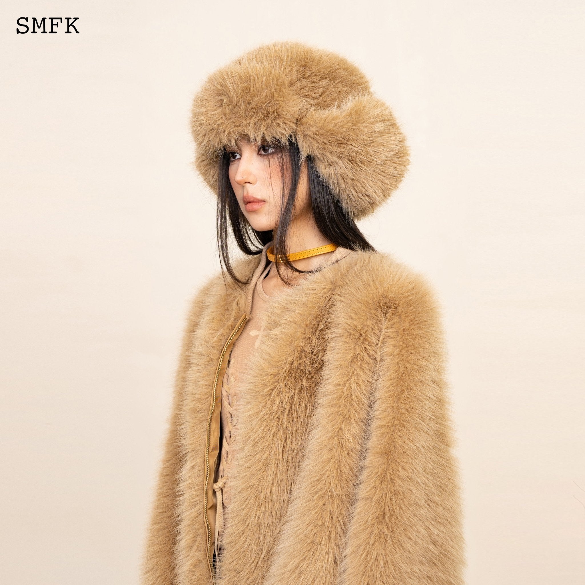 Compass Cross Winter Faux Fur Hat In Wheat