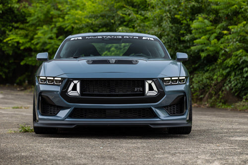 Front end view of 2024 Mustang RTR featuring front grille and additional accessories