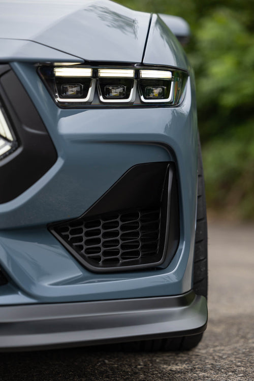 New 2024 Mustang Corner Grilles that feature RTR's textured design element adds depth and dimension to the front end, creating a dynamic visual effect that conveys motion even in stillness
