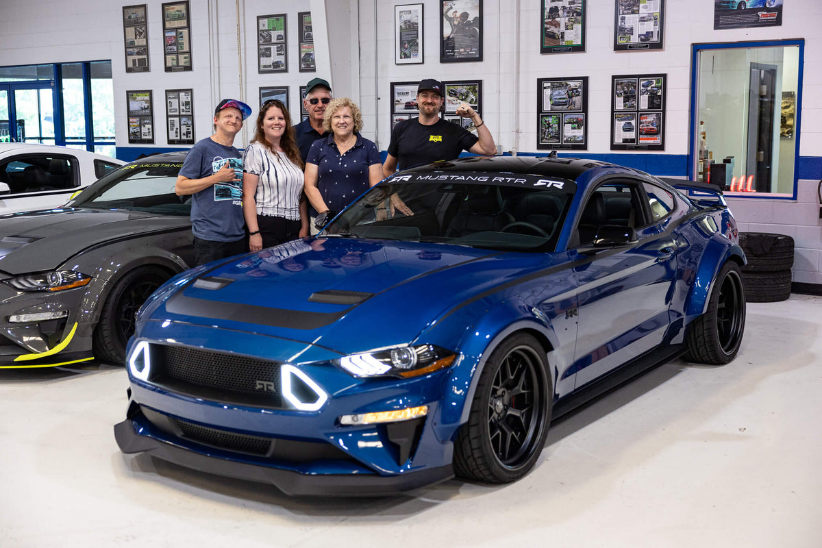 Vaughn, Tom and Family next to Tom's 2023 Mustang RTR Spec 5