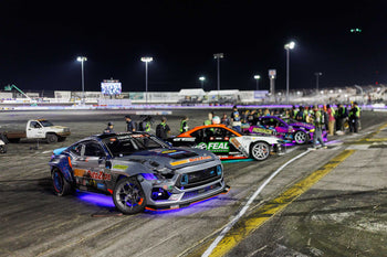 James Deane and Odi Bakchis parked next to each other in the Formula Drift Irwindale Podium lineup.