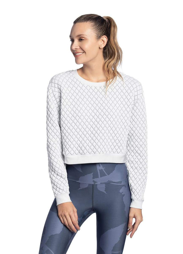 white quilted sweatshirt