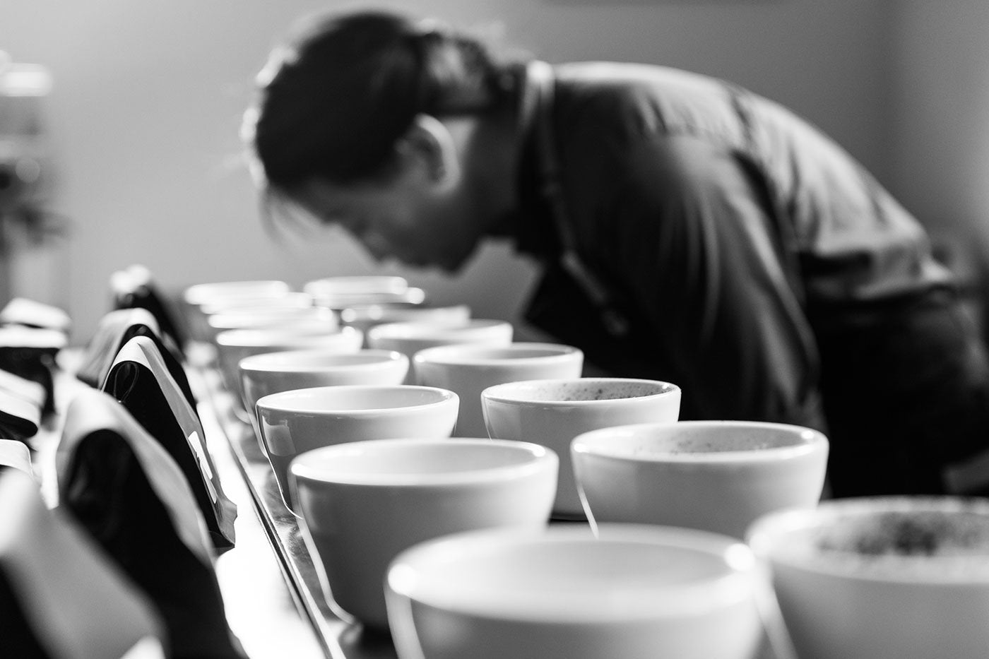 Jackie Suiter in the cupping room at Kona Coffee Purveyors