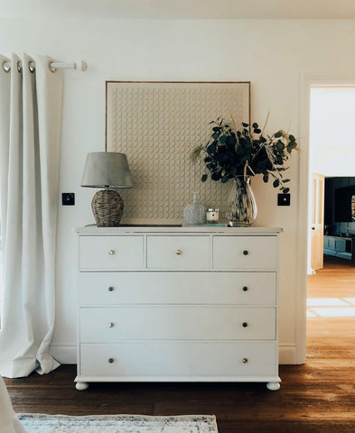 White chest of drawers with white washed top