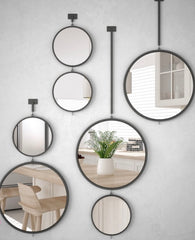 Gallery wall of circle mirrors 
