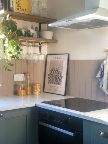 Kitchen panelling with green kitchen cabinets