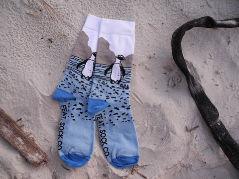 Men's blue penguin socks by FEAT. socks. Designed and made in Cape Town