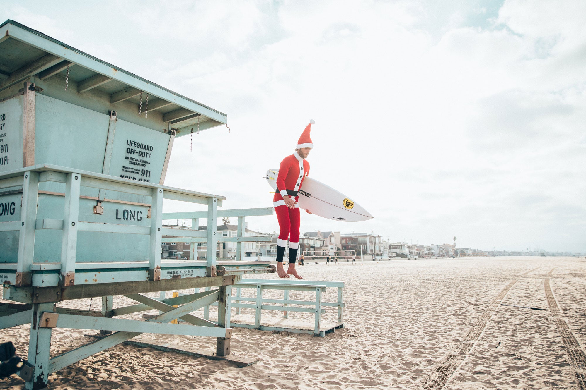 Santa Jumping Off Lifeguard Tower