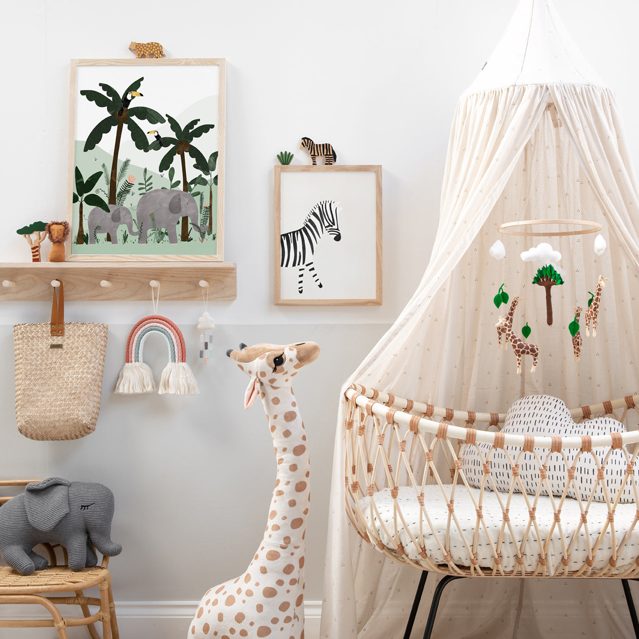 animal-safari-themed-nursery-giraffe-decor-hello-little-one-rope-rainbow-wood-peg-shelf-giraffe-plushie