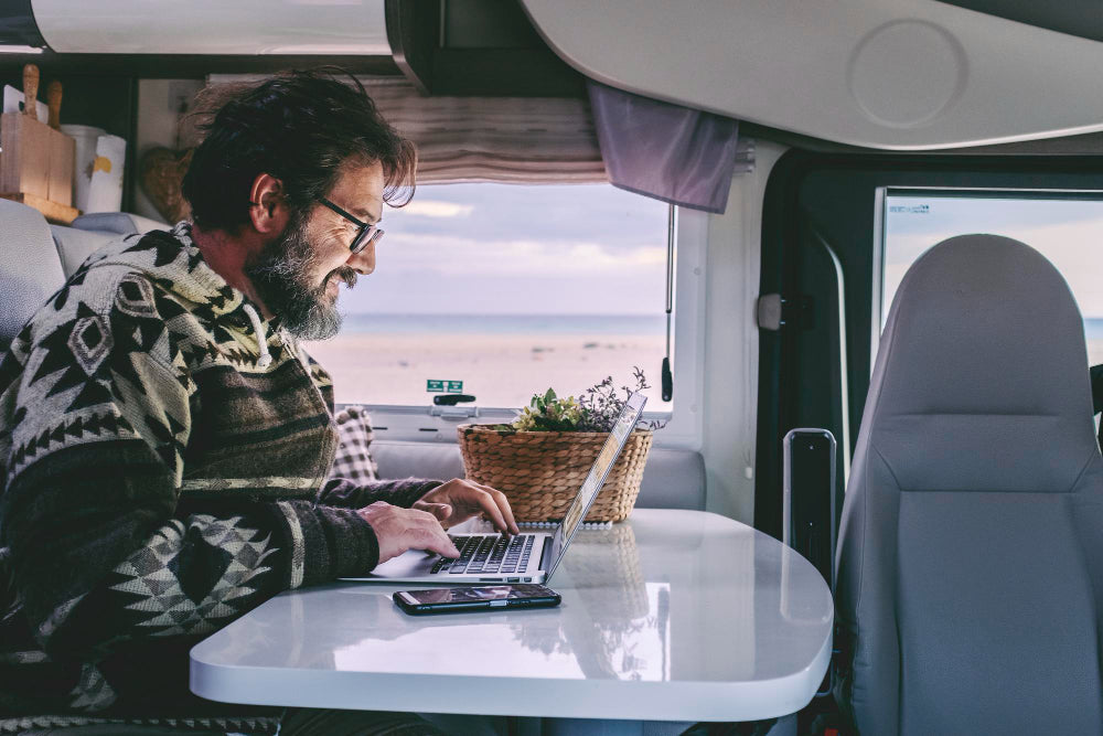 man working from RV