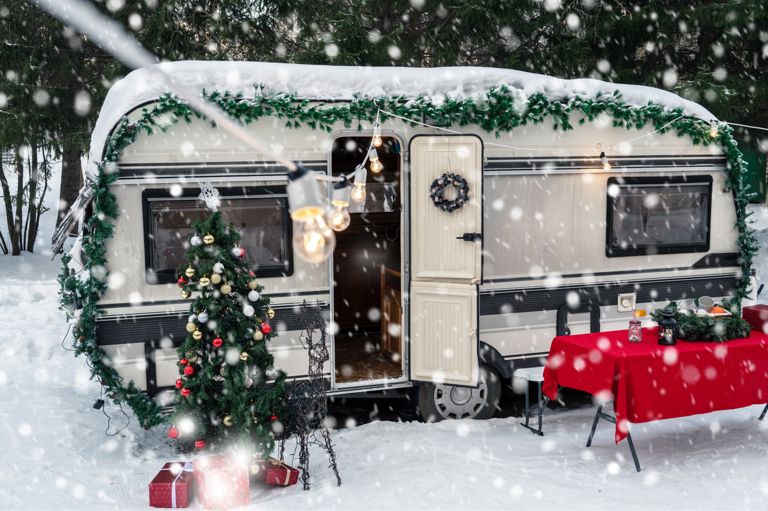 Campervan motorhome in winter camping decorated