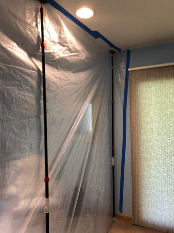 Zipwall poles and plastic sheeting create a temporary hot box for killing bed bugs in smaller items like luggage..